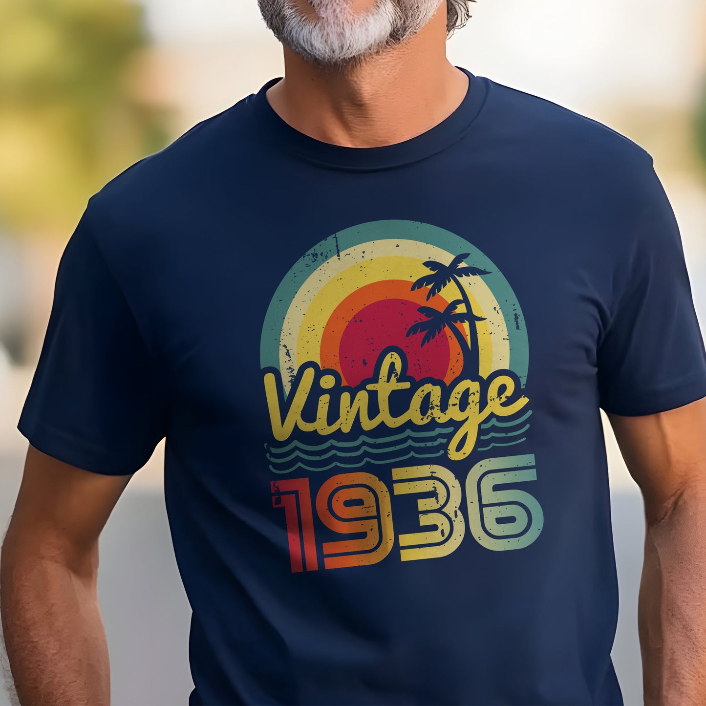 Man wearing a navy blue t-shirt with a 'Vintage 1936' graphic design.